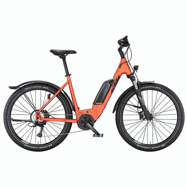Bicicleta de montanha elétrica KTM Macina AERA P571 Street, cor laranja queimado mate.